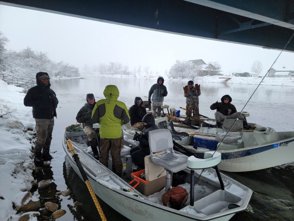 Image of a group of fly fishing clients who booked a multiple boat trip with Ryan Stefek Outfitting in Thermopolis, WY